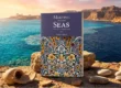 The book cover of 'Meeting of Two Seas' by Saeed A Malik, showcasing an intricate mosaic tile pattern, is centered in an epic ancient coastal landscape. The background visualizes the dramatic confluence of two seas under a sacred sky, representing the historical and Quranic meeting point of Hazrat Musa and Hazrat Khidr 4000 years ago, focusing on the natural environment with no humans. This is detailed, contains all context, and is SEO optimized.